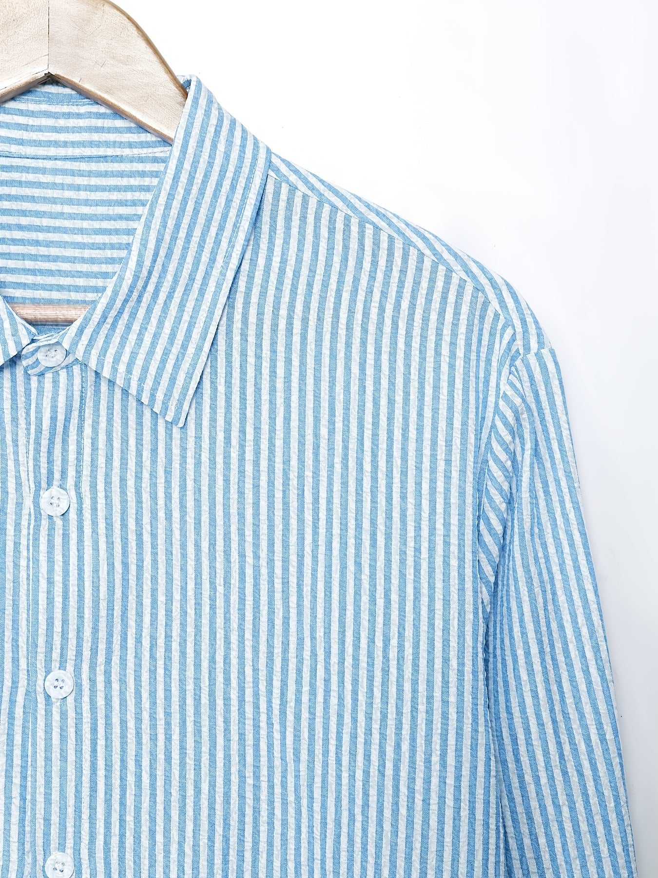 Effortless Blue Striped Seersucker Blouse for Women with Collar Long Sleeve Button Front Relaxed Style