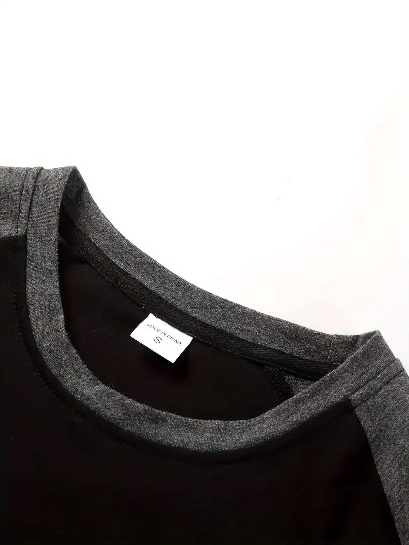 Comfortable Black Colorblock Shirt for Women with Crew Neck Raglan Sleeve Relaxed Casual Style