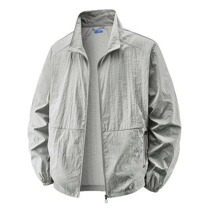Effortless Crinkled Nylon Windbreaker for Women with Stand Collar Long Sleeve Zip Pocket Relaxed Style