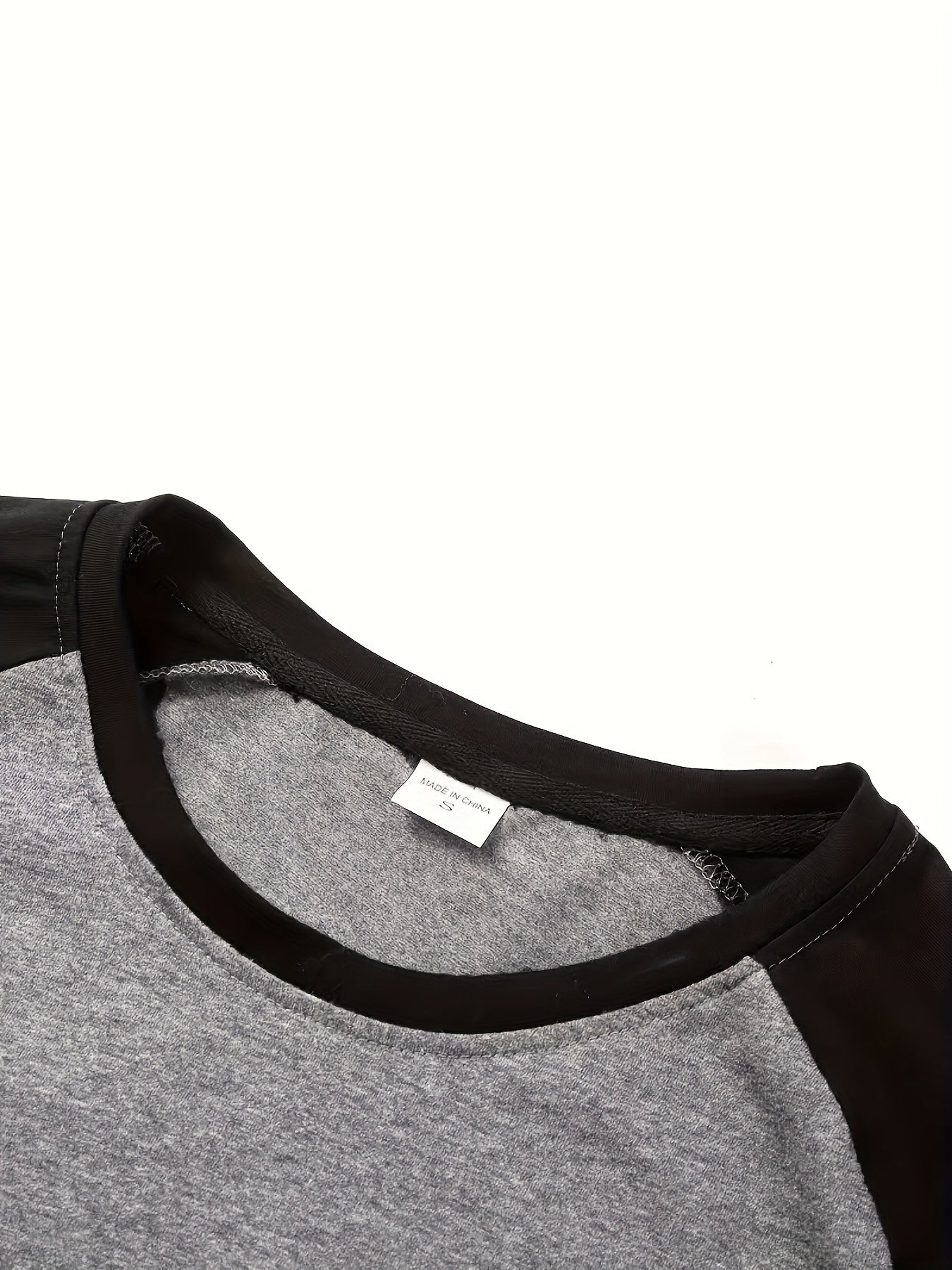 Comfortable Black Colorblock Shirt for Women with Crew Neck Raglan Sleeve Relaxed Casual Style